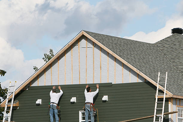 Professional Siding Replacement technician working in Midland, WA
